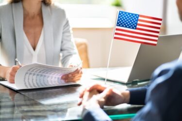 Phoenix immigration lawyer helping their client. What does an immigration lawyer do?