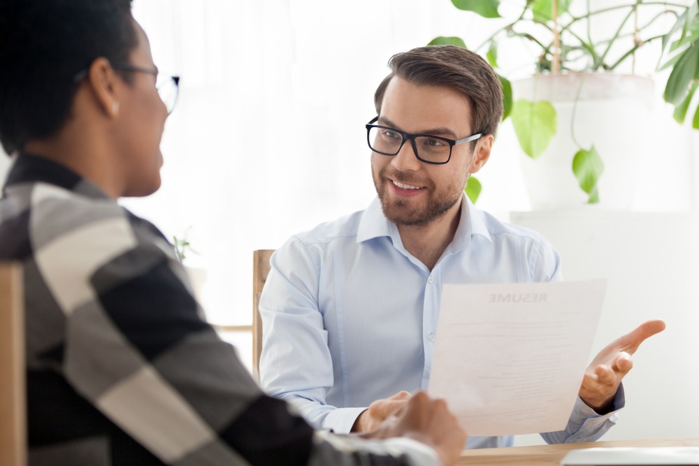 Boss holding a recommendation letter. What is a letter of recommendation for immigration?